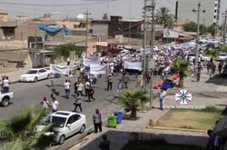 بالصور .. مسيرة جماهيرية حاشدة تتجه لمقر الأمم المتحدة تنديدا بتهجير المسيحيين من العراق