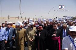 بالصور .. مسيرة جماهيرية حاشدة تتجه لمقر الأمم المتحدة تنديدا بتهجير المسيحيين من العراق