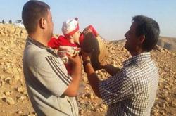 بالصور .. داعش تحاصر النازحون بجبل سنجار .. طائفة عراقية ستباد إما جوعاً أو نحرا