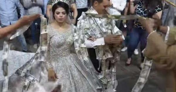 نقطة بالإجبار وعنقود مال يصل إلى 70 مترا.. أغرب مواقف حفلات الزفاف حول العالم - صور