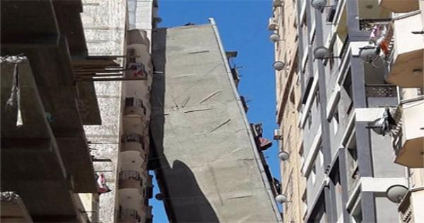 إحالة 3 موظفين بالحي للمحاكمة التأديبية في واقعة برج الإسكندرية المائل