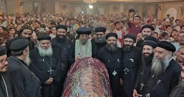 احتفالات مدينة إسنا بعيد استشهاد الأم دولاجي وأولادها - صور