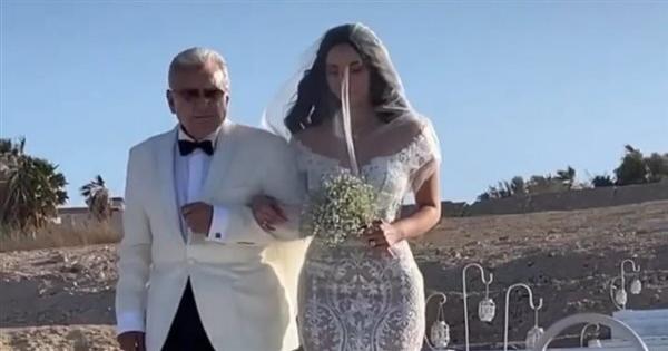 الصور الأولى لـ بسنت شوقي بالفستان الأبيض من حفل زفافها على محمد فراج