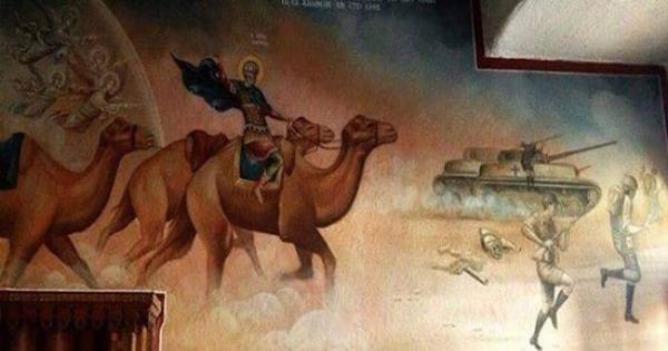 قصة أيقونة الشهيد العظيم (مارمينا) ألعجائبي وهو يمتطي جمل ويطارد عدد من الجنود الألمان، وبيجرى ورا دبابه